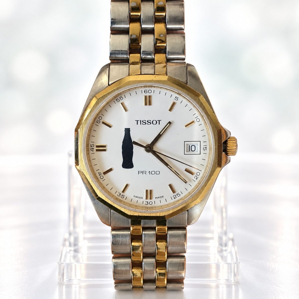 Tissot PR 100 bicolor edición Coca-Cola · esfera blanca
